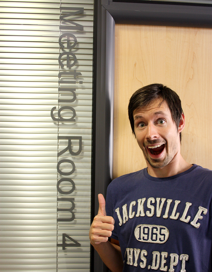 Stewart Speer looking very excited for CodeRaiser outside meeting room 4